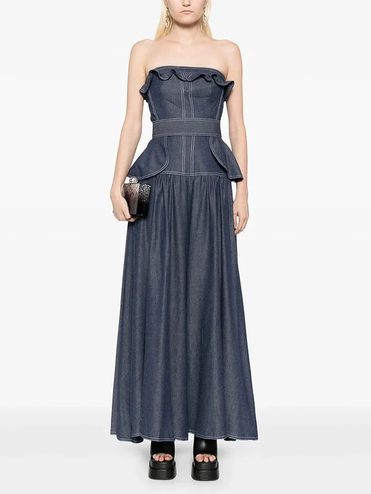 SIGRID PEPLUM-WAIST DENIM JUMPSUIT IN NAVY BLUE