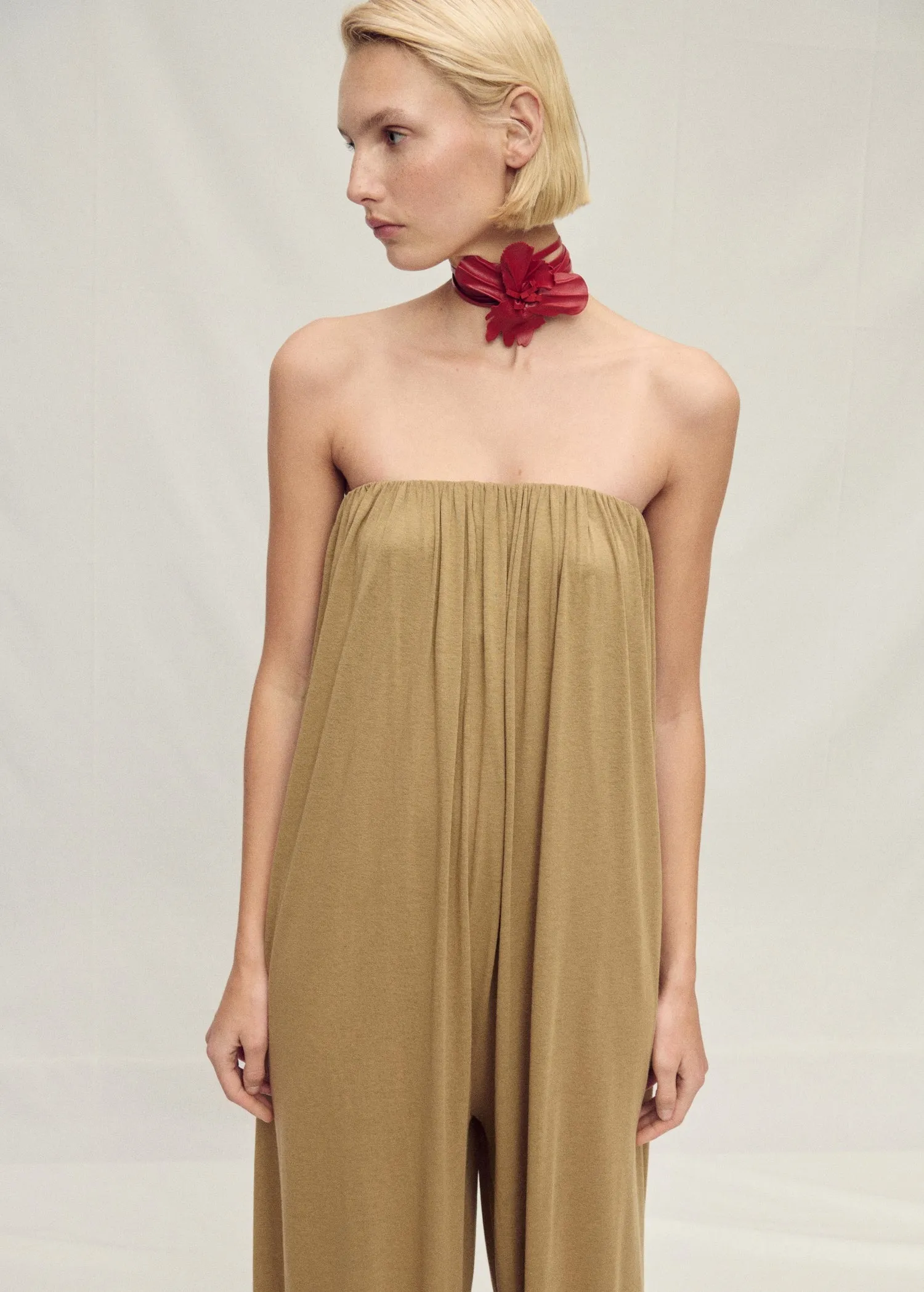 Strapless jumpsuit with puffed hem