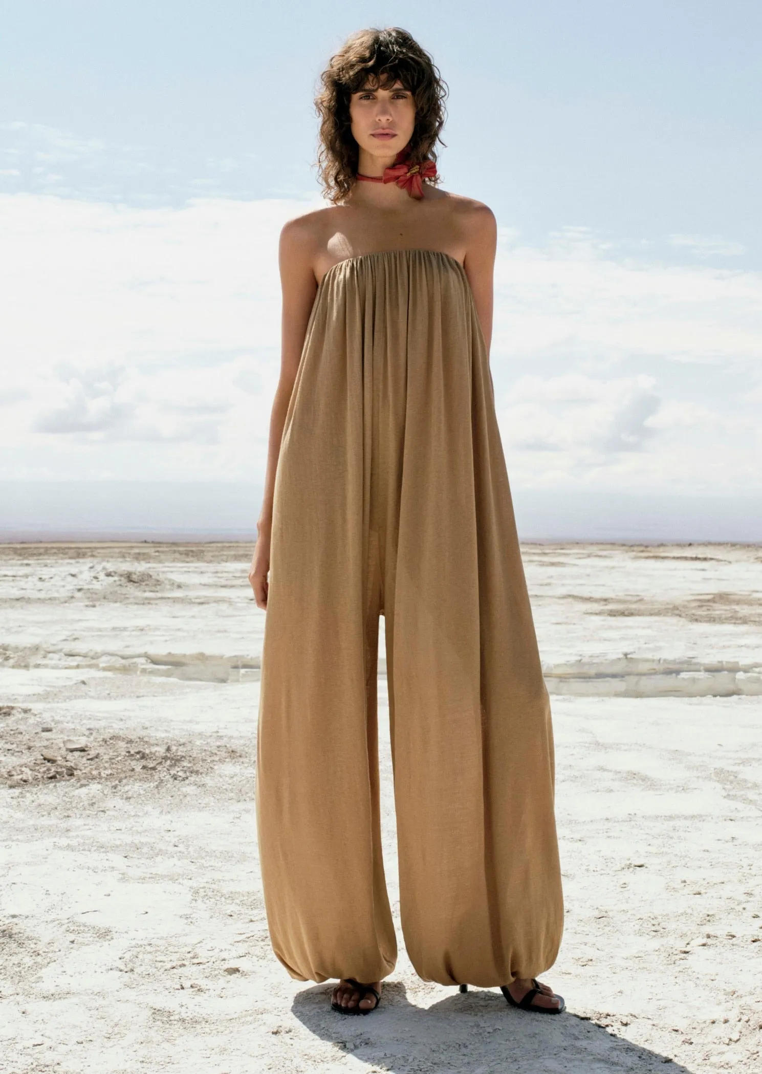 Strapless jumpsuit with puffed hem