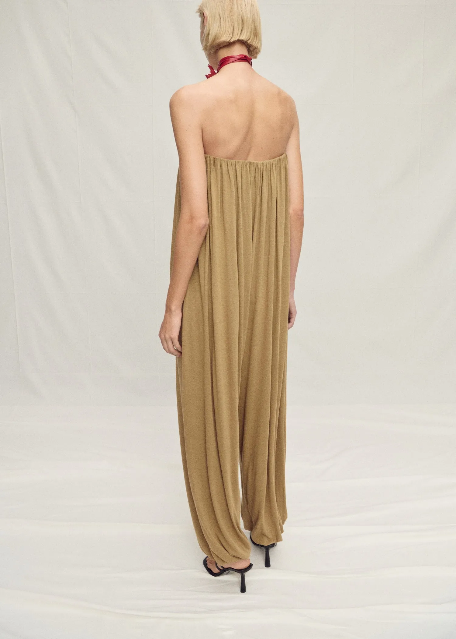 Strapless jumpsuit with puffed hem