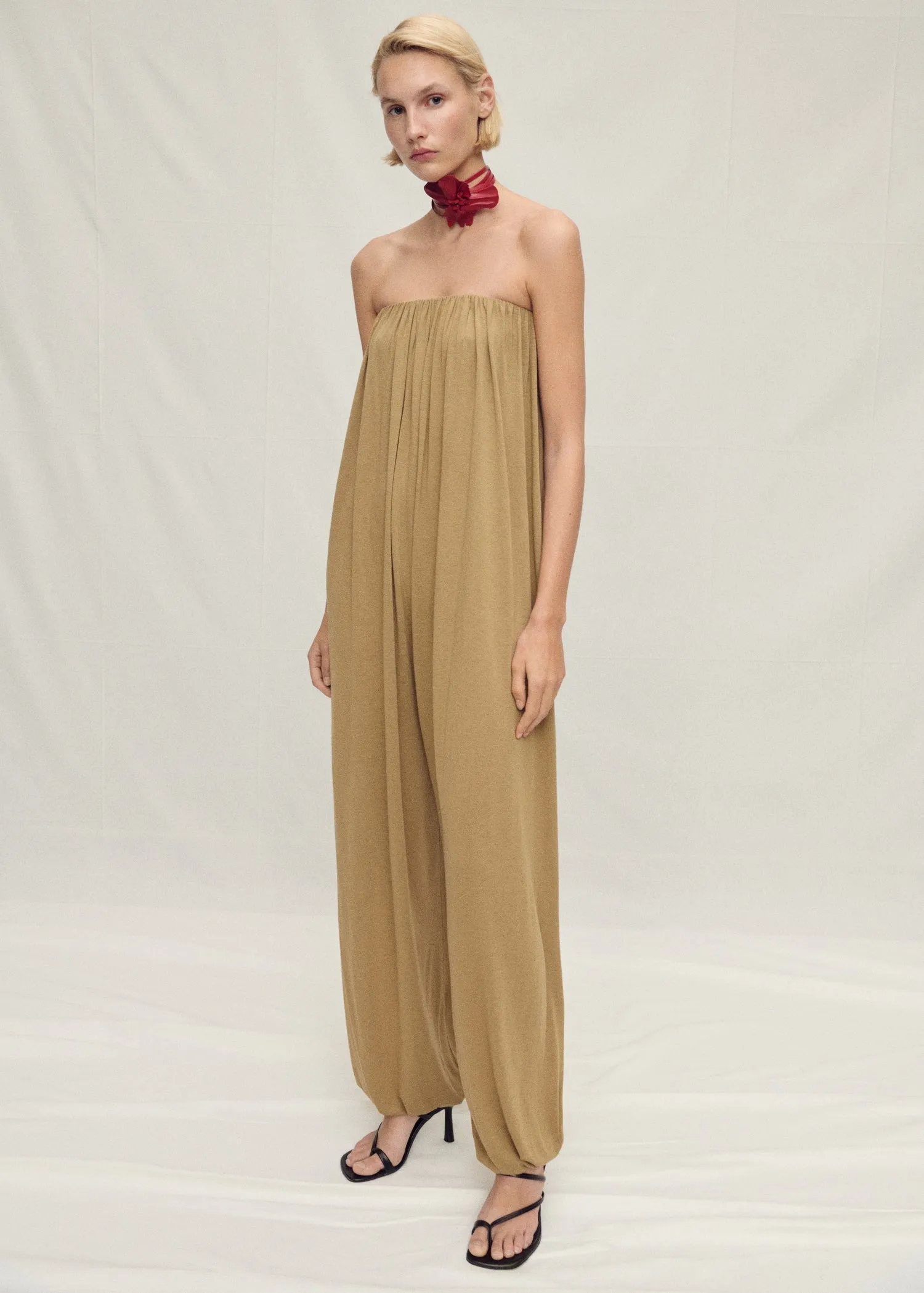 Strapless jumpsuit with puffed hem