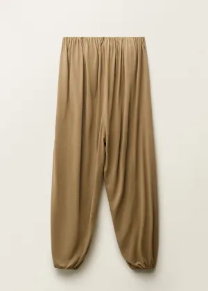 Strapless jumpsuit with puffed hem