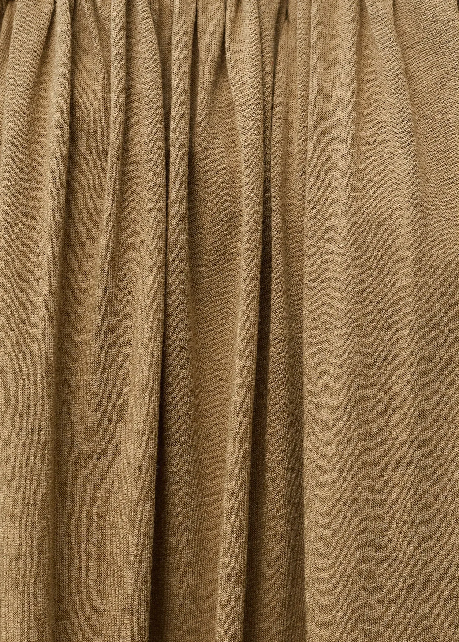Strapless jumpsuit with puffed hem