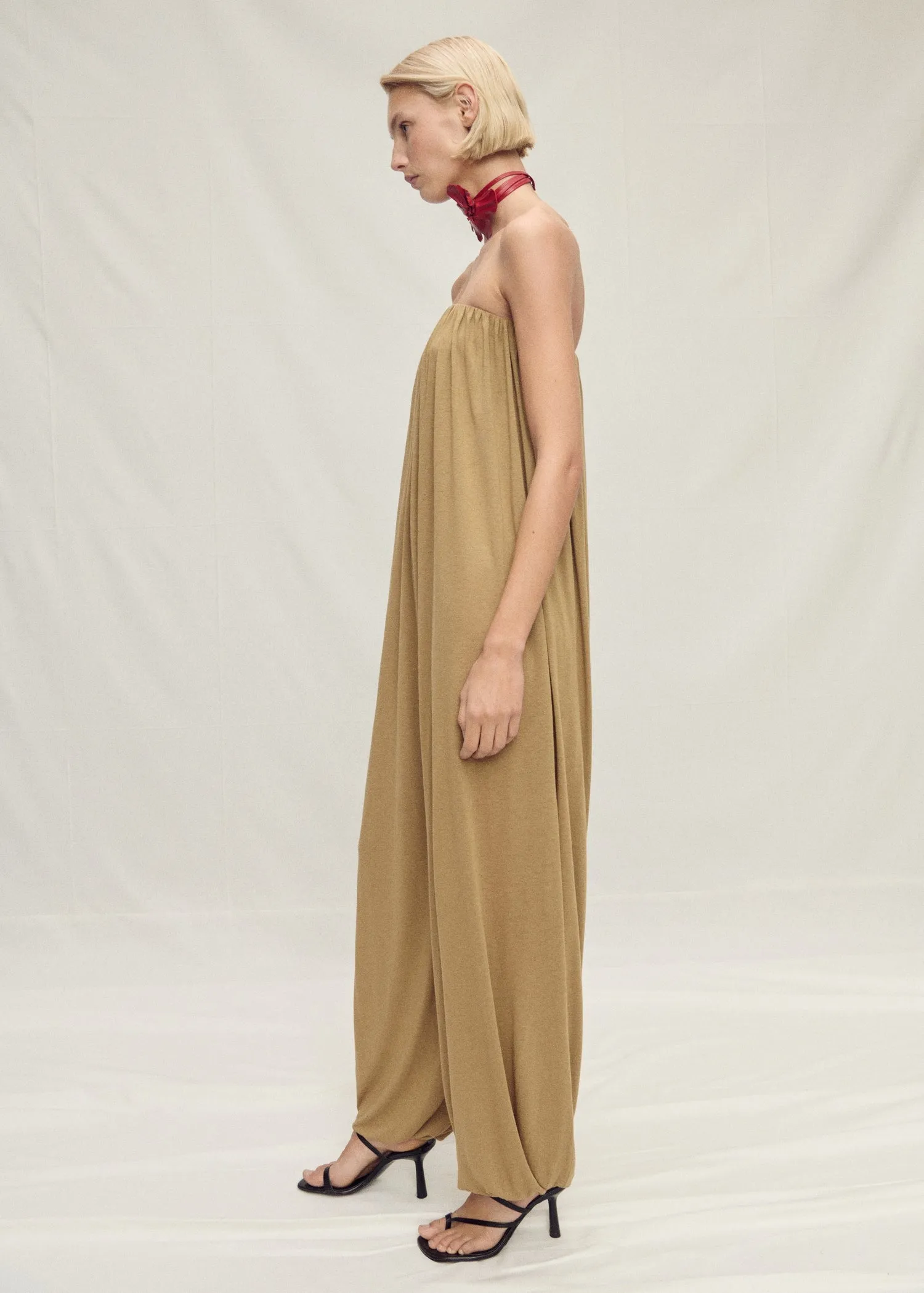 Strapless jumpsuit with puffed hem